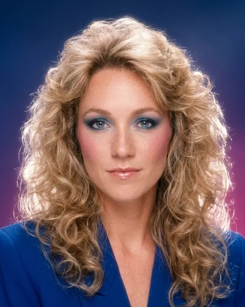 The same woman as an '80s studio portrait.